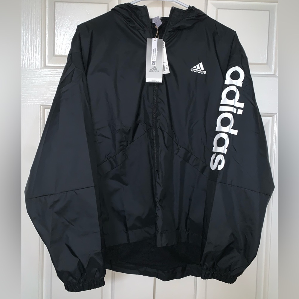 Brand new, perfect condition Adidas Lin Wind Breaker